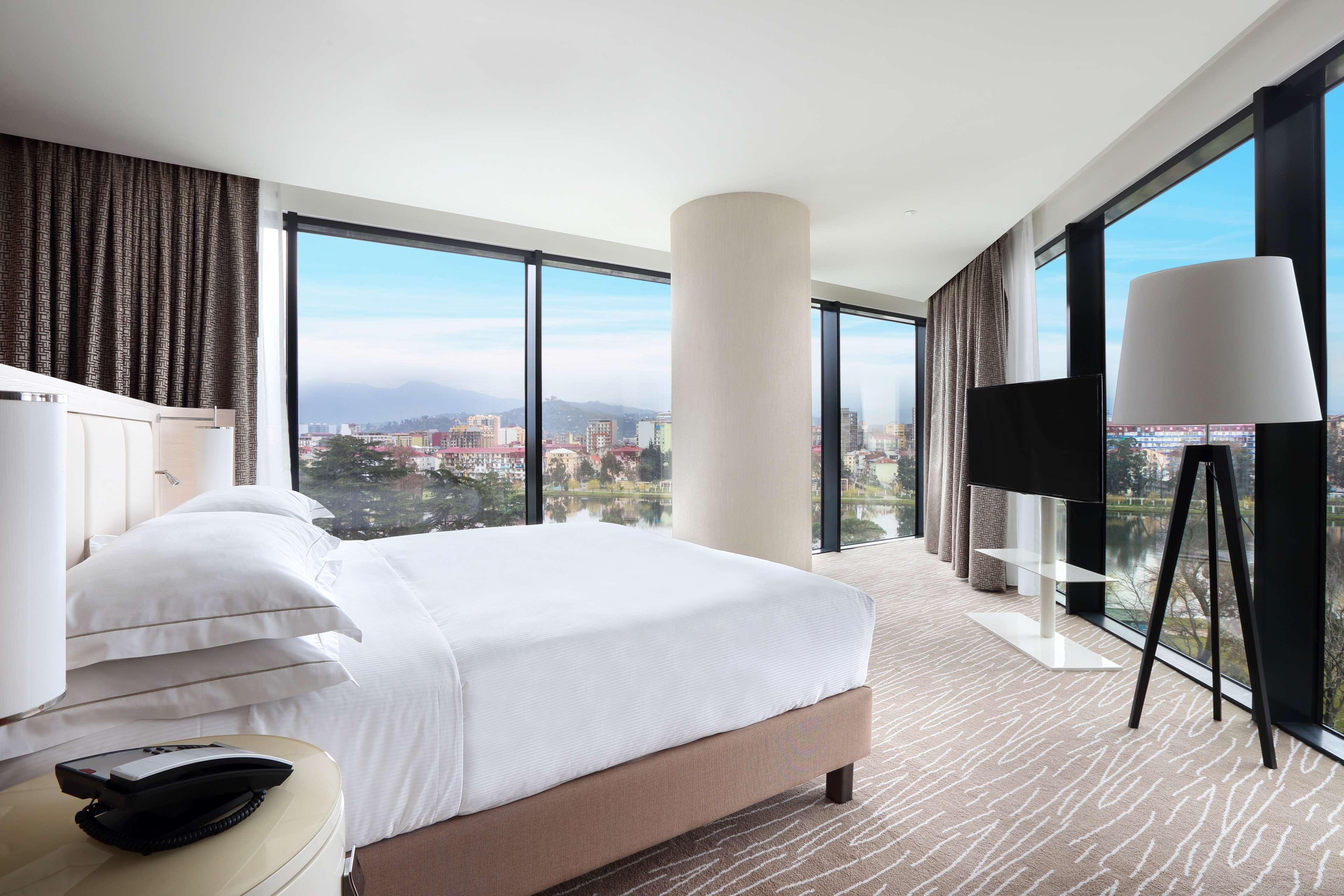 Hilton Batumi Hotell Exteriör bild A bedroom at the hotel