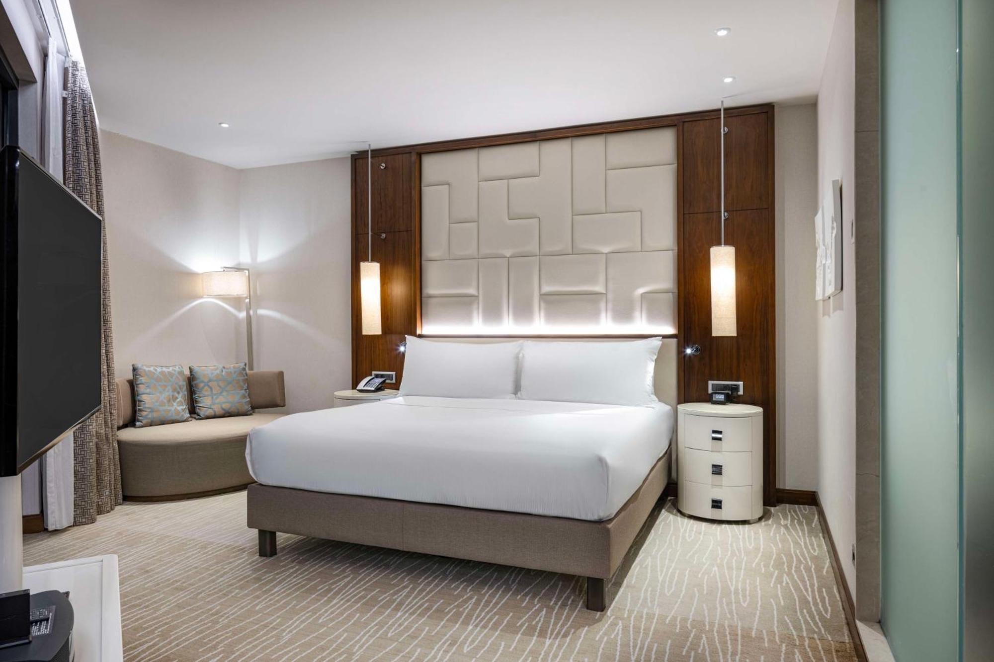 Hilton Batumi Hotell Exteriör bild A bedroom at the hotel